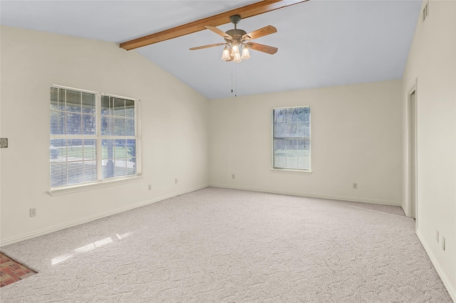 unfurnished room with lofted ceiling with beams, ceiling fan, and carpet floors