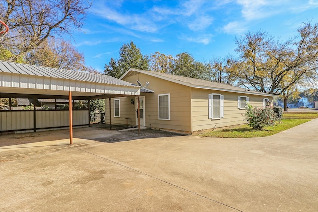 view of front of house with a carport