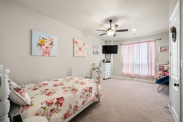 bedroom featuring ceiling fan and carpet floors