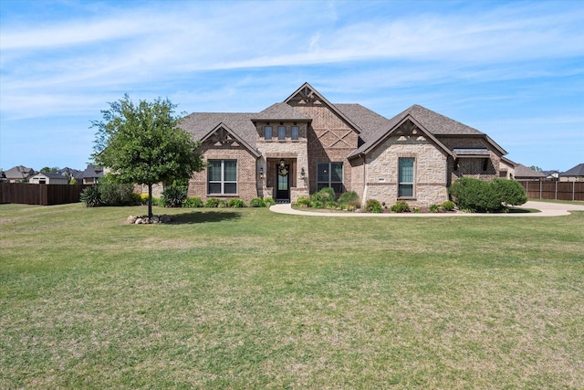 view of front of house with a front lawn