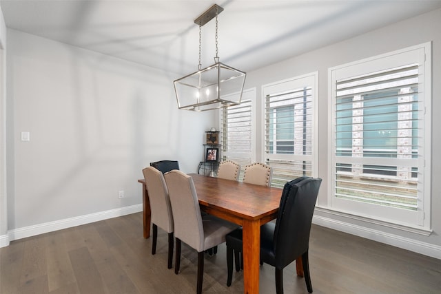 dining space featuring dark hardwood / wood-style floors