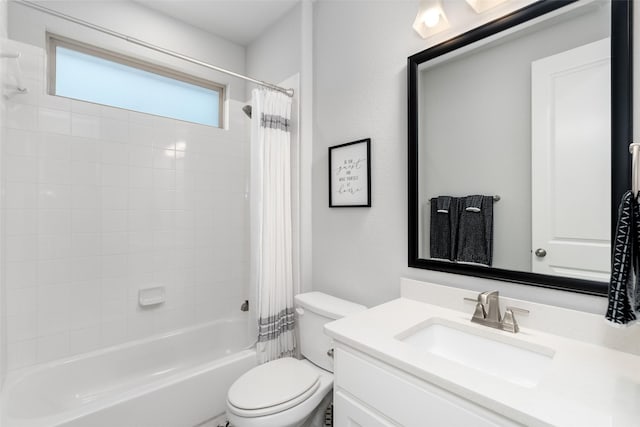 full bathroom featuring vanity, shower / bath combination with curtain, and toilet