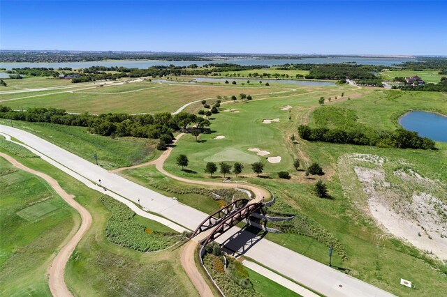 birds eye view of property featuring a rural view and a water view