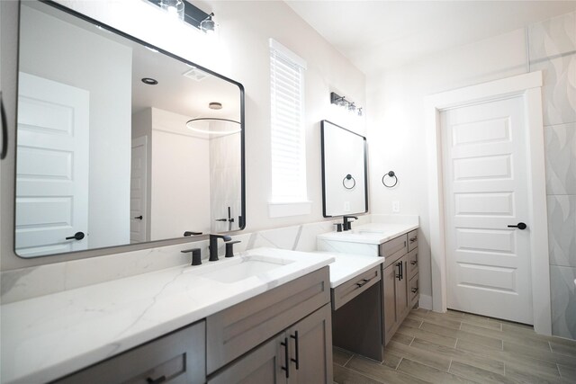 bathroom featuring hardwood / wood-style flooring and vanity