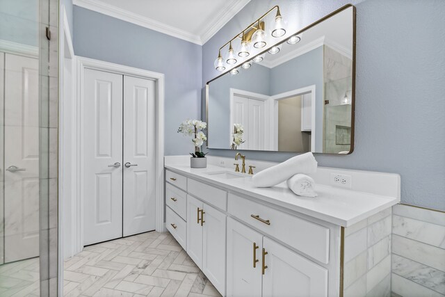 bathroom featuring crown molding, vanity, and an enclosed shower