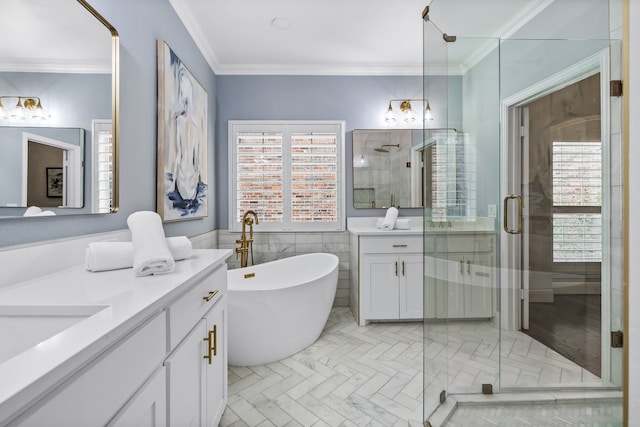 bathroom with shower with separate bathtub, vanity, plenty of natural light, and ornamental molding