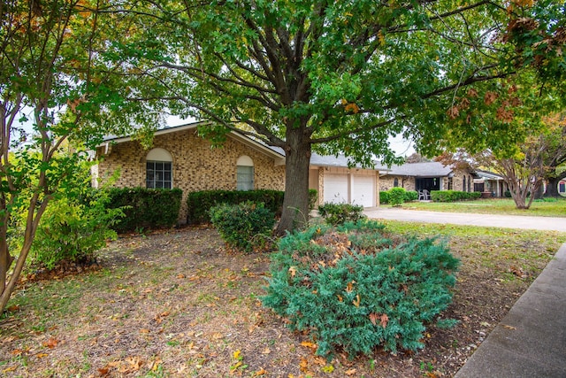 ranch-style home with a garage