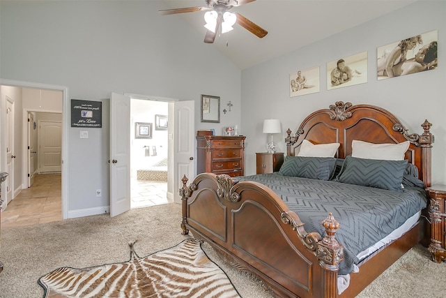 carpeted bedroom featuring ceiling fan and high vaulted ceiling