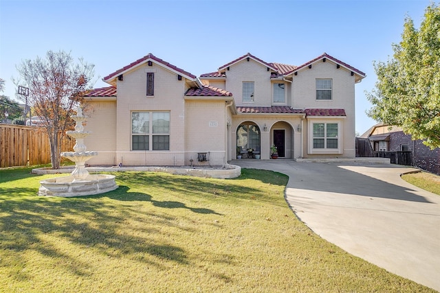 rear view of property featuring a yard