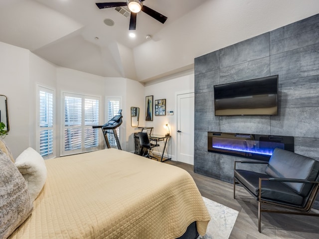 bedroom with hardwood / wood-style flooring and ceiling fan