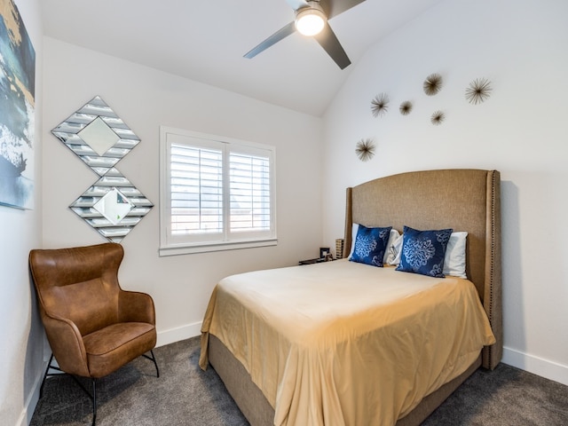 carpeted bedroom featuring ceiling fan and vaulted ceiling