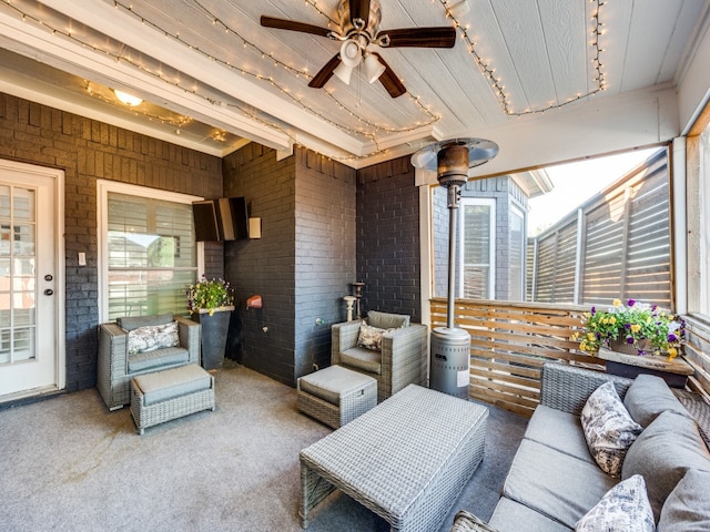 view of patio featuring ceiling fan