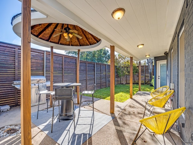 view of patio / terrace featuring ceiling fan