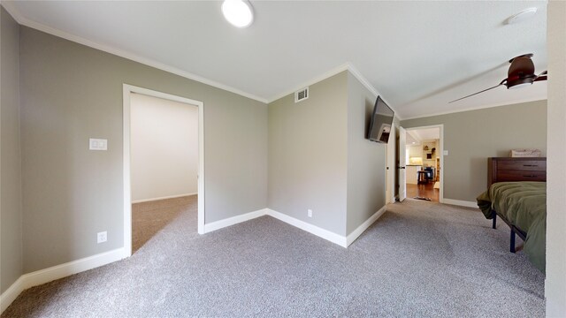 carpeted bedroom featuring ornamental molding