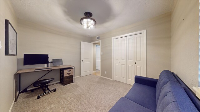 office area with light colored carpet