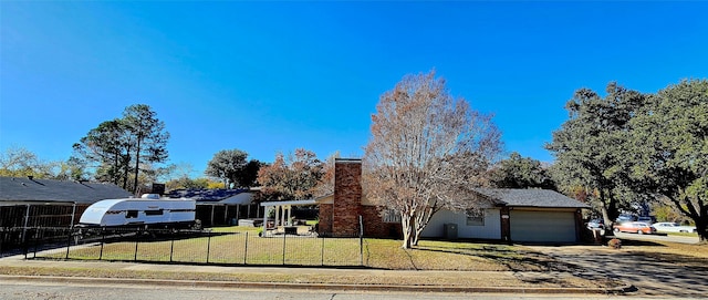 single story home with a garage and a front yard