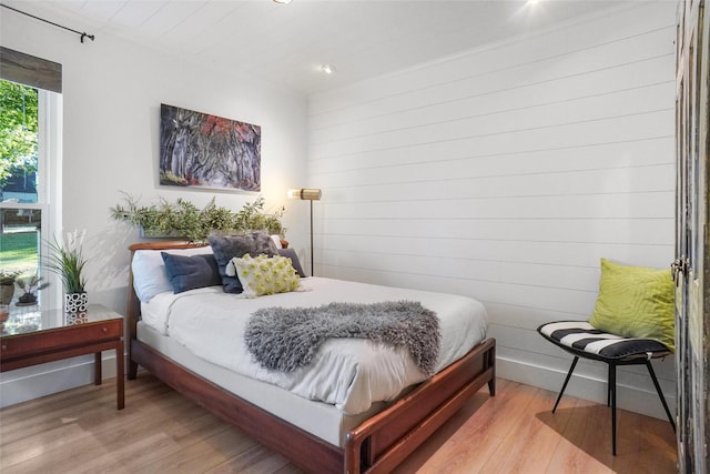 bedroom featuring light wood-style flooring