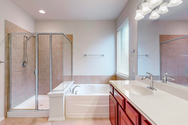 bathroom with vanity, separate shower and tub, and tile patterned floors