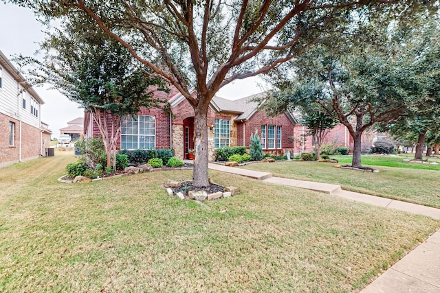 ranch-style house with a front lawn