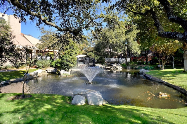 view of community featuring a lawn