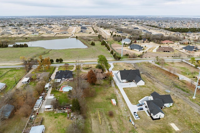 aerial view with a water view and a residential view