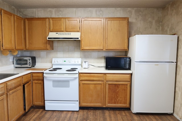 kitchen with dark wood-type flooring, white appliances, range hood, and decorative backsplash