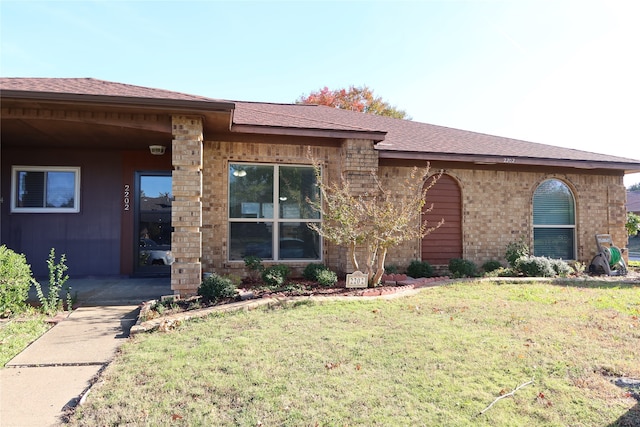 view of front of house with a front yard