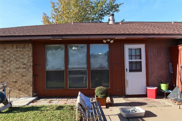 rear view of house featuring a patio area