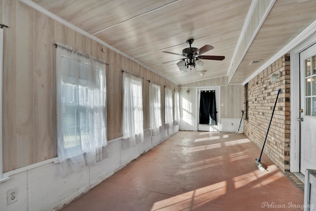 unfurnished sunroom with ceiling fan, lofted ceiling, and wooden ceiling