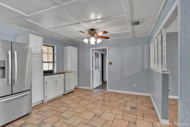 kitchen featuring white cabinetry, ceiling fan, stainless steel fridge, and dishwasher