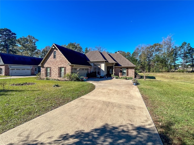 view of front facade featuring a garage and a front lawn