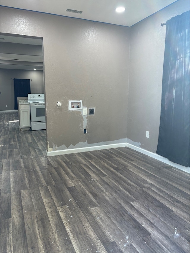 laundry room featuring dark hardwood / wood-style floors