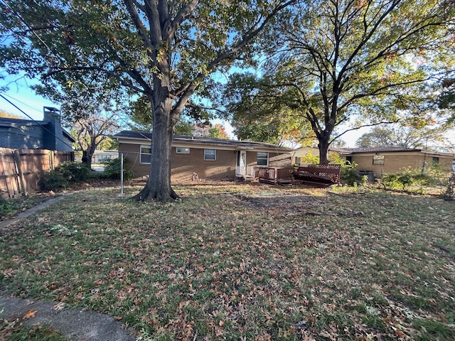 view of yard with a wooden deck