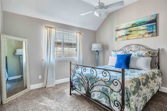 bedroom featuring carpet, vaulted ceiling, and ceiling fan