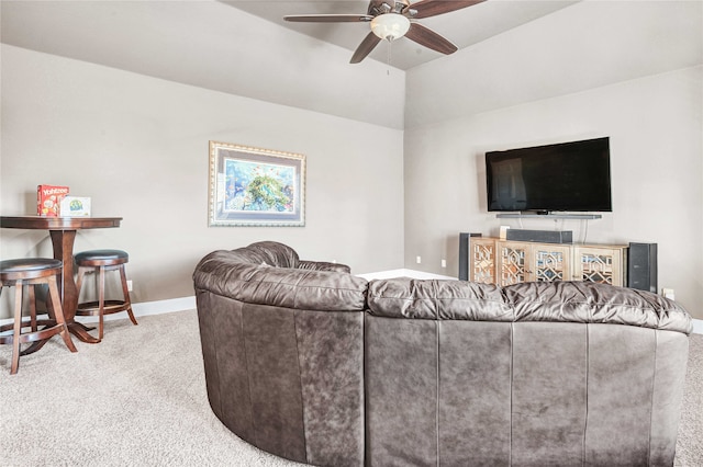 carpeted living room featuring ceiling fan