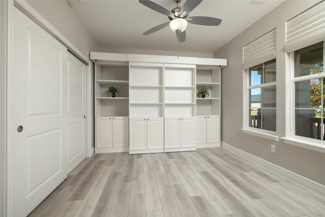 interior space featuring light hardwood / wood-style flooring and ceiling fan