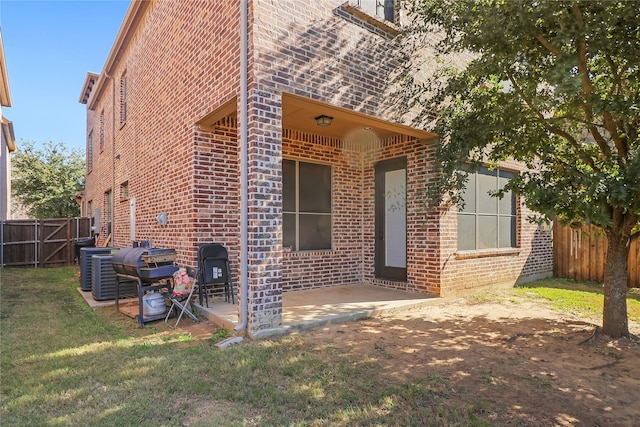 exterior space with a patio area and a yard