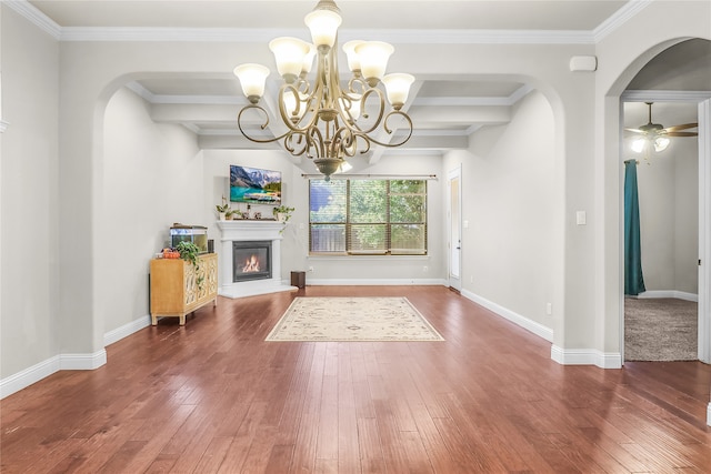 foyer entrance featuring beamed ceiling, ceiling fan with notable chandelier, dark hardwood / wood-style flooring, and crown molding