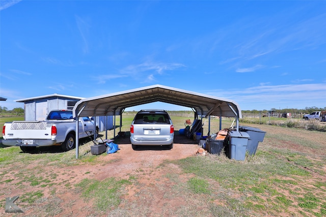 view of vehicle parking featuring a carport