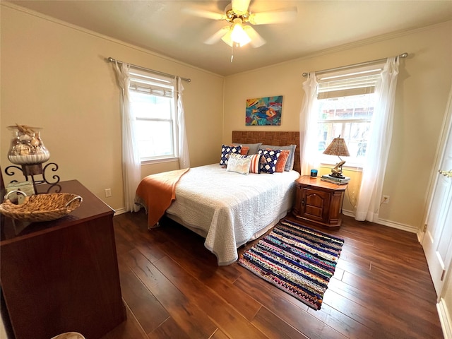 bedroom featuring ceiling fan and dark hardwood / wood-style flooring