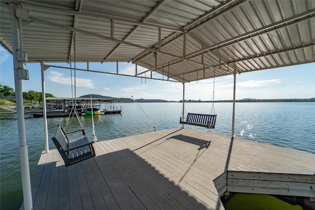 view of dock with a water view