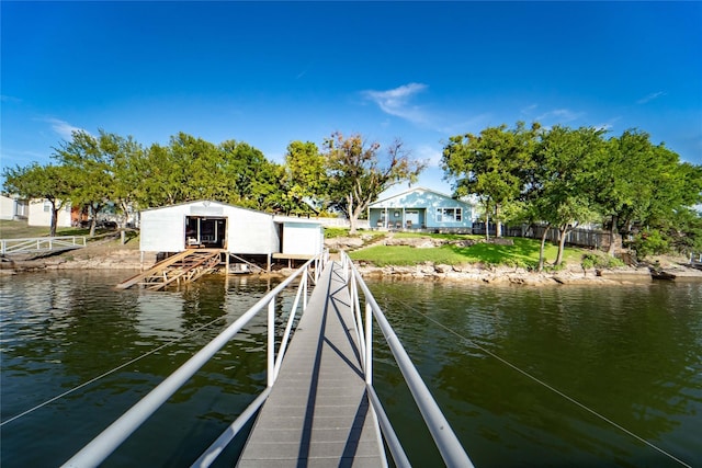 dock area with a water view