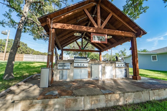 view of patio featuring a gazebo, a grill, and area for grilling