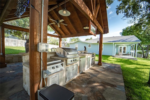 view of patio / terrace with french doors, sink, ceiling fan, area for grilling, and a grill