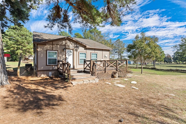 view of front of home with a front yard