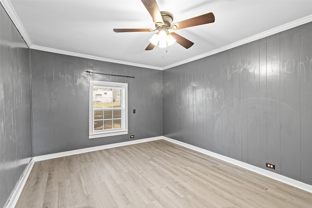 unfurnished room with ornamental molding, ceiling fan, and light hardwood / wood-style floors