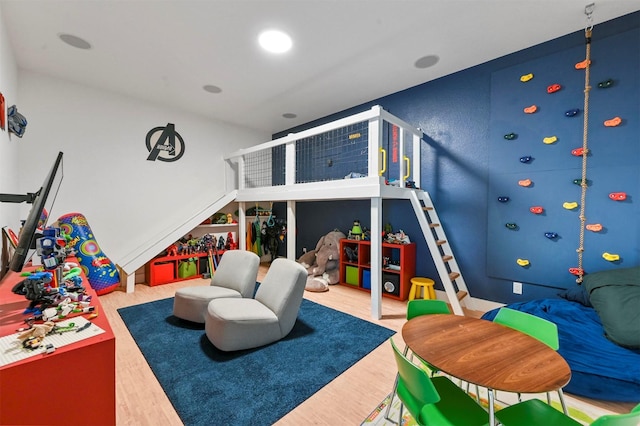 game room featuring hardwood / wood-style flooring