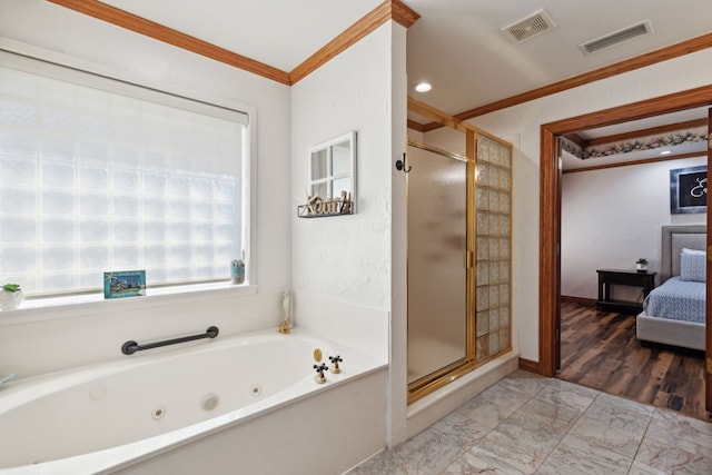 bathroom with shower with separate bathtub and ornamental molding