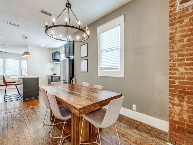 dining area featuring hardwood / wood-style flooring