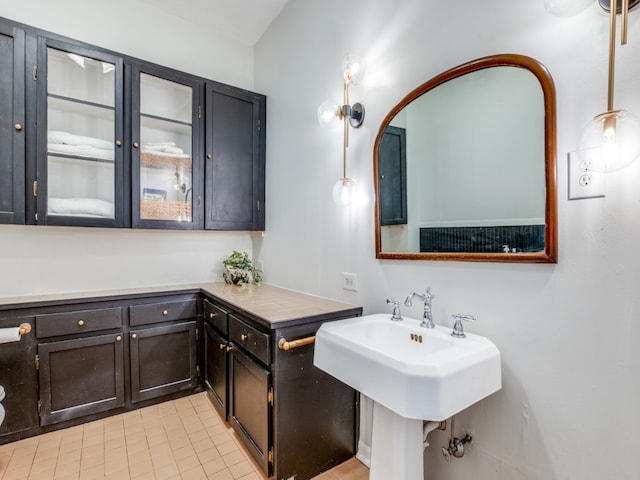 bathroom featuring tile patterned flooring